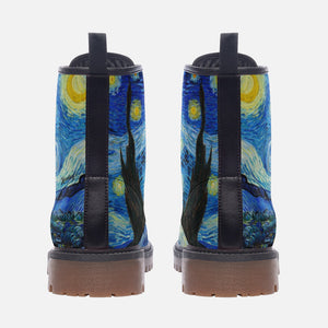 a pair of boots with a painting on them