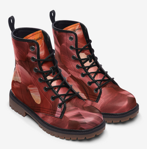 a pair of red boots with black laces