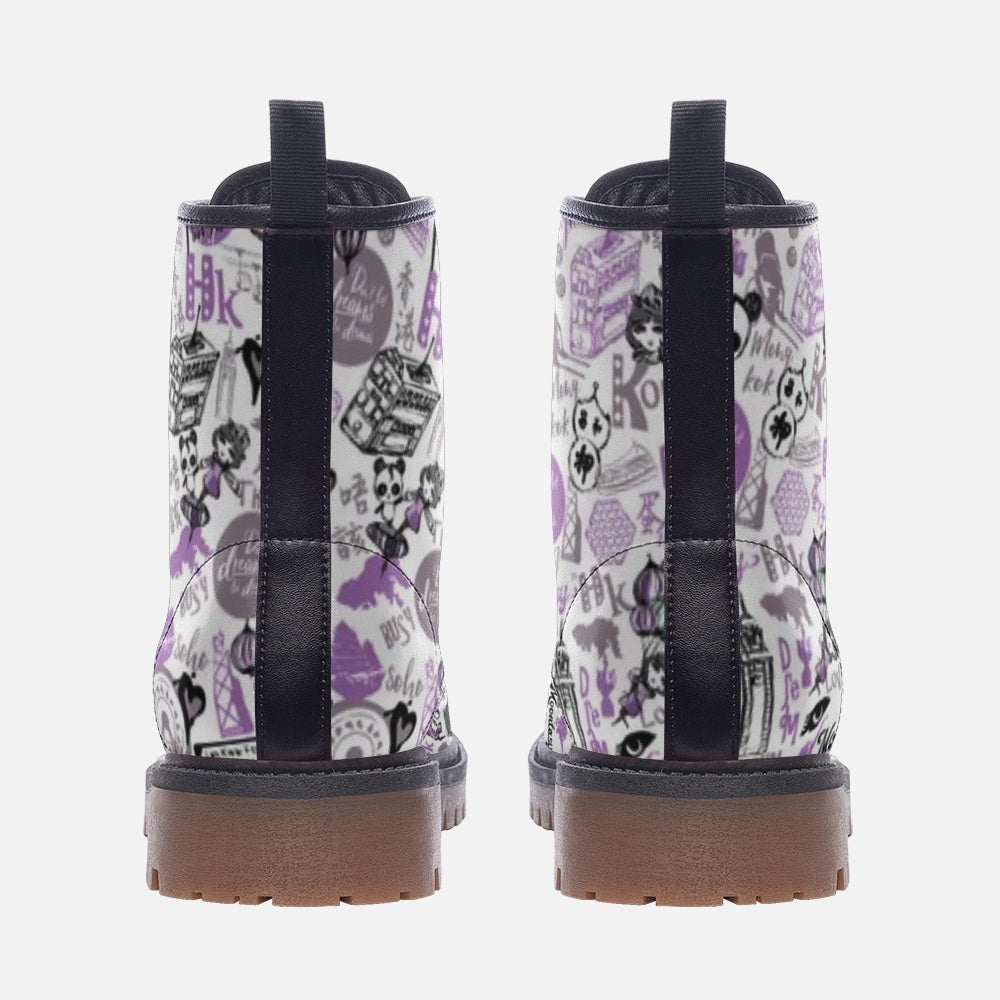 a pair of white and purple boots with black straps