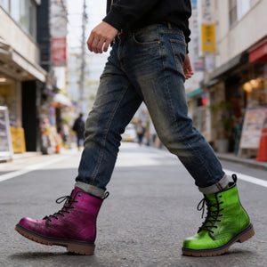 A person wearing blue jeans and purple and green boots is walking down a city street.
