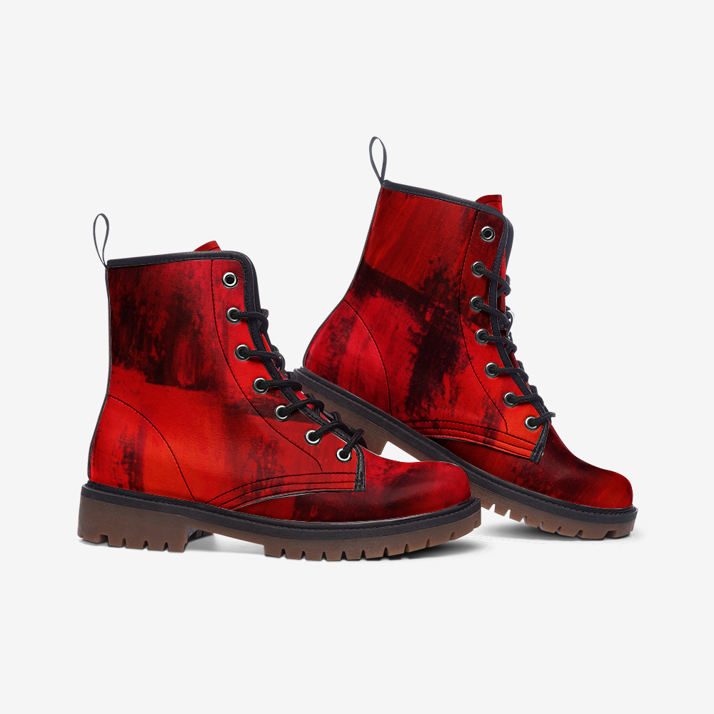 a pair of red boots with black laces