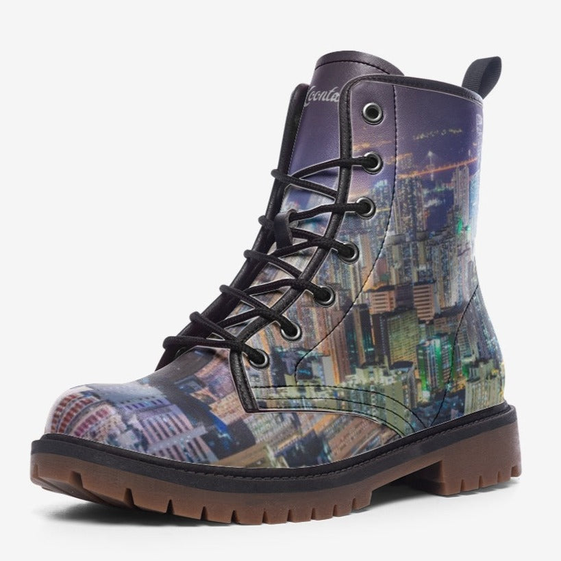 a pair of boots with a picture of a city