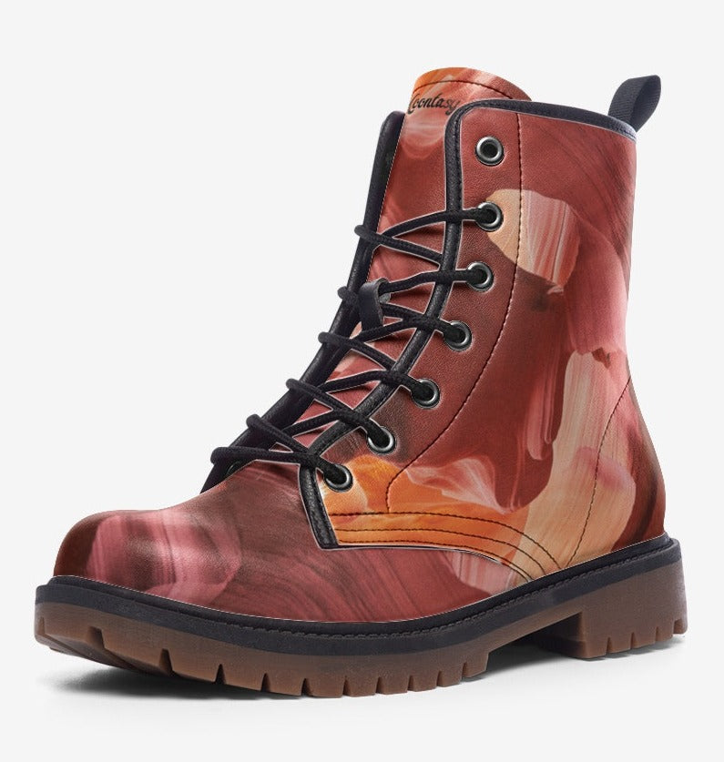 a close up of a pair of boots on a white background