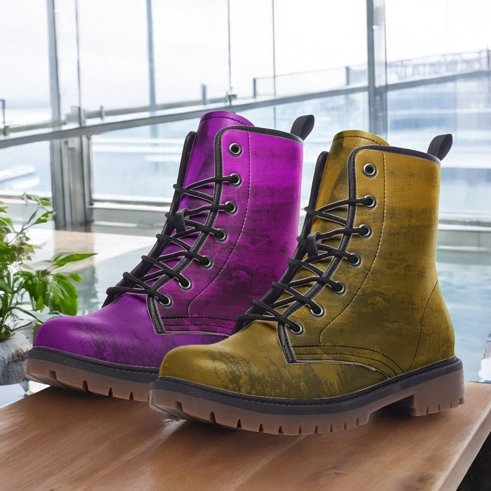a pair of colorful boots sitting on top of a wooden table