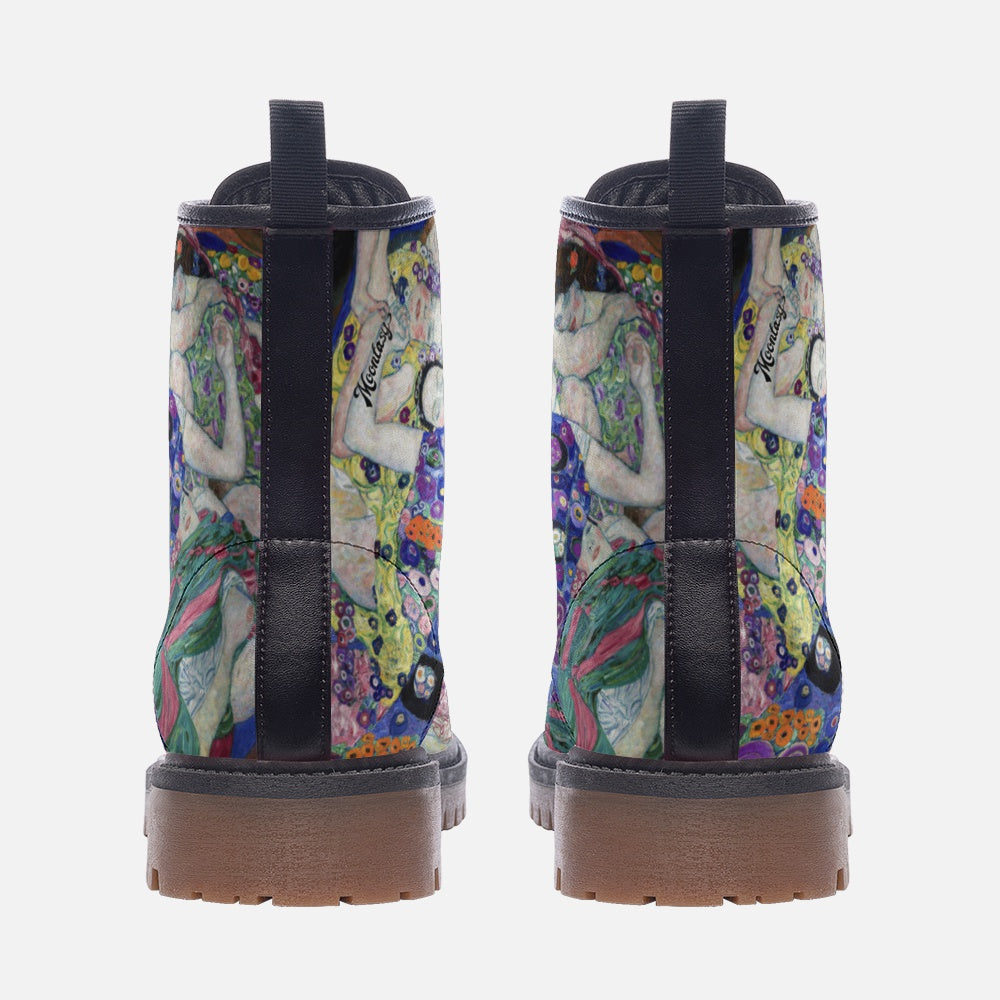 a close up of a pair of boots with a pattern
