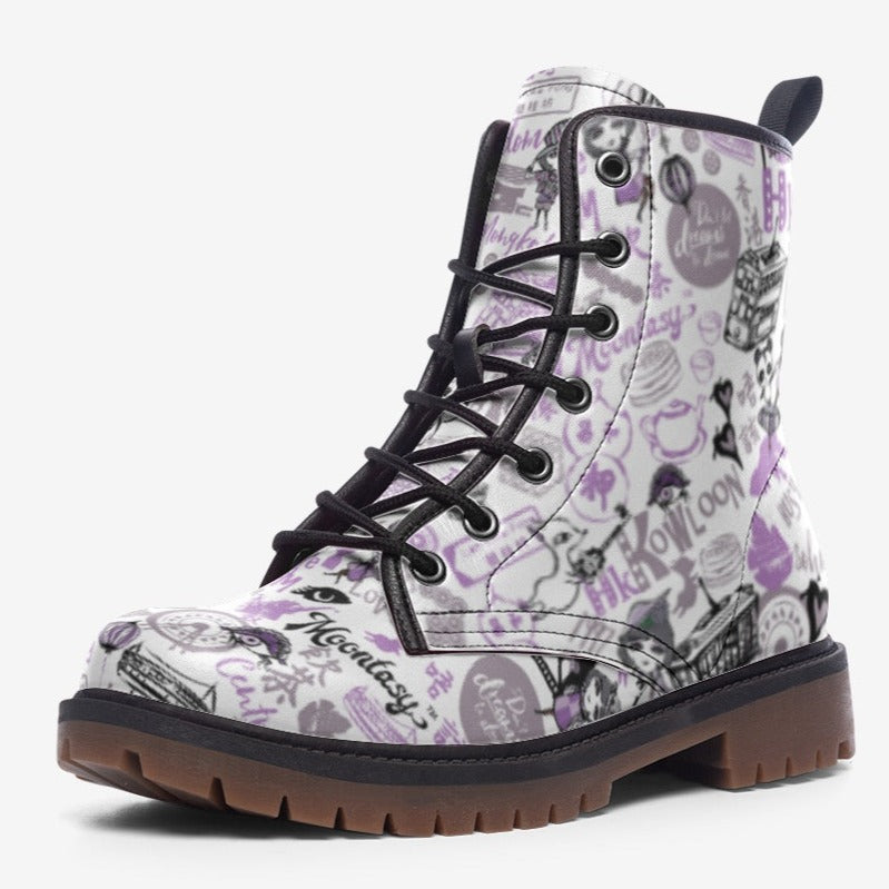 a pair of white and purple boots with skulls on them