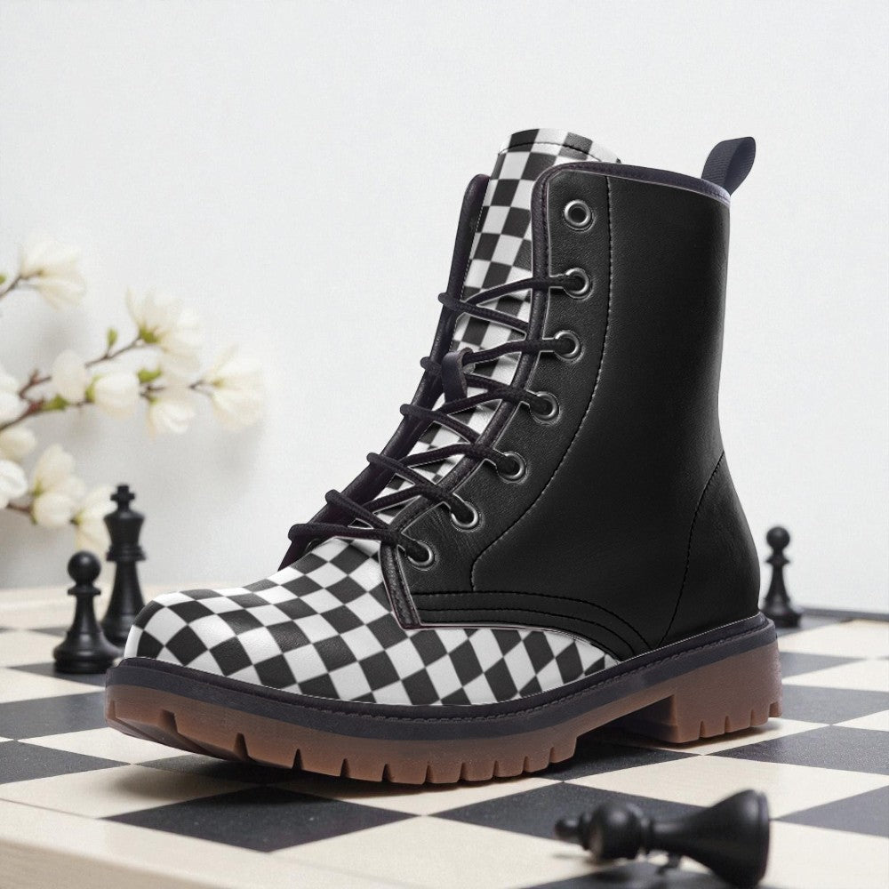 A black and white checkered boot is placed on a chessboard, with a branch of white flowers in the background.