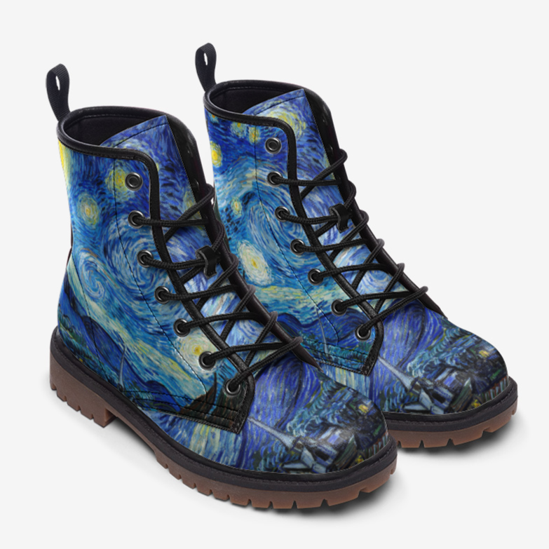 a pair of blue boots with a painting on them