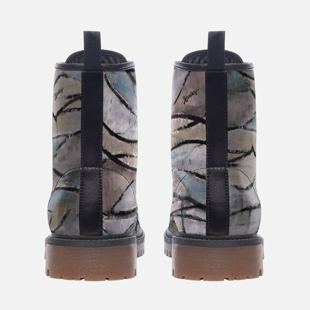 a close up of a pair of boots on a white background