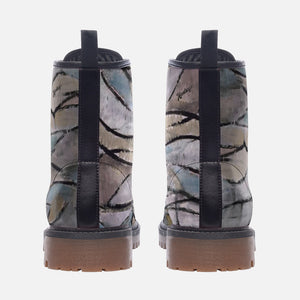 a close up of a pair of boots on a white background