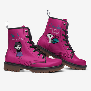 a pair of pink boots with cartoon characters on them