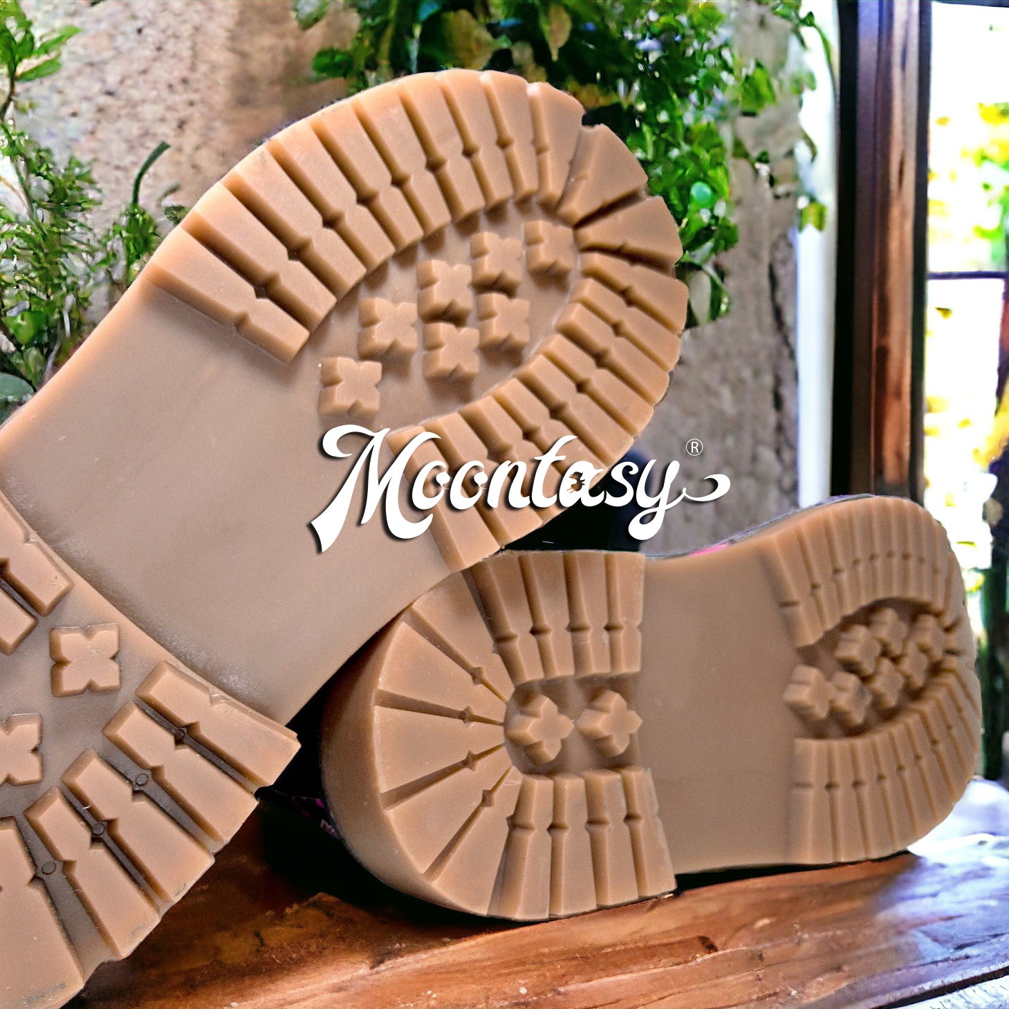 a pair of shoes sitting on top of a wooden table