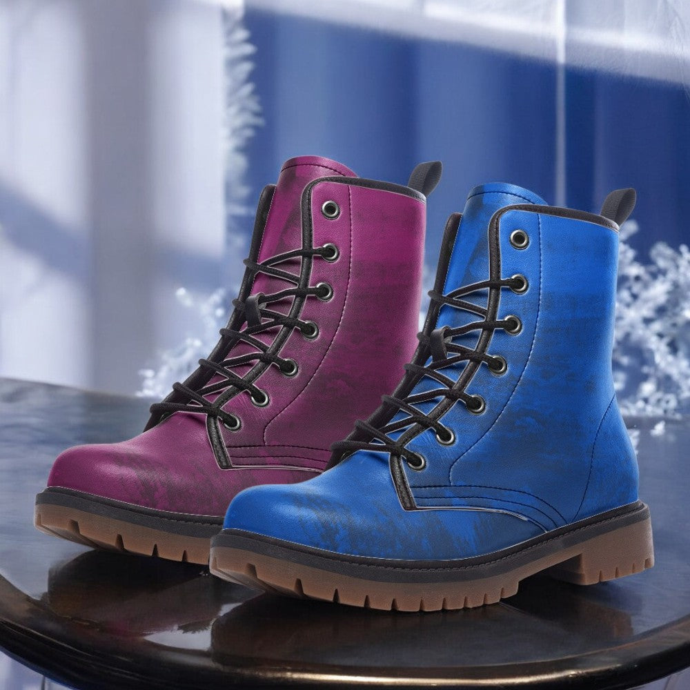 a pair of colorful boots sitting on top of a table