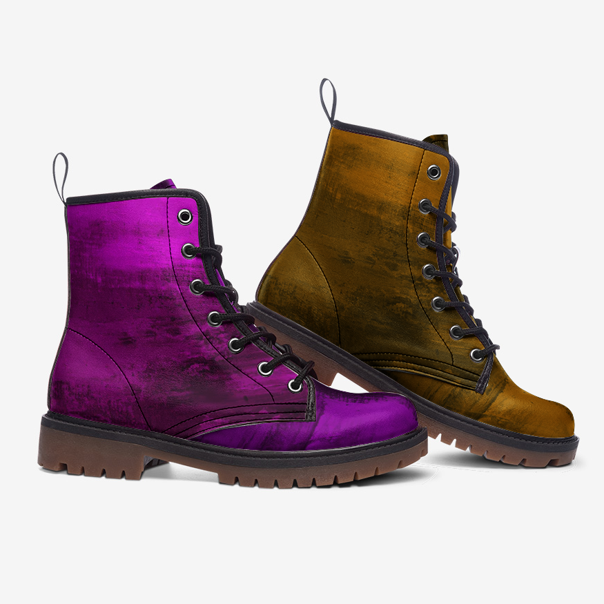 a pair of purple and brown boots sitting next to each other