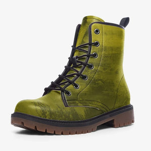 A pair of green and black combat boots with a rugged appearance.