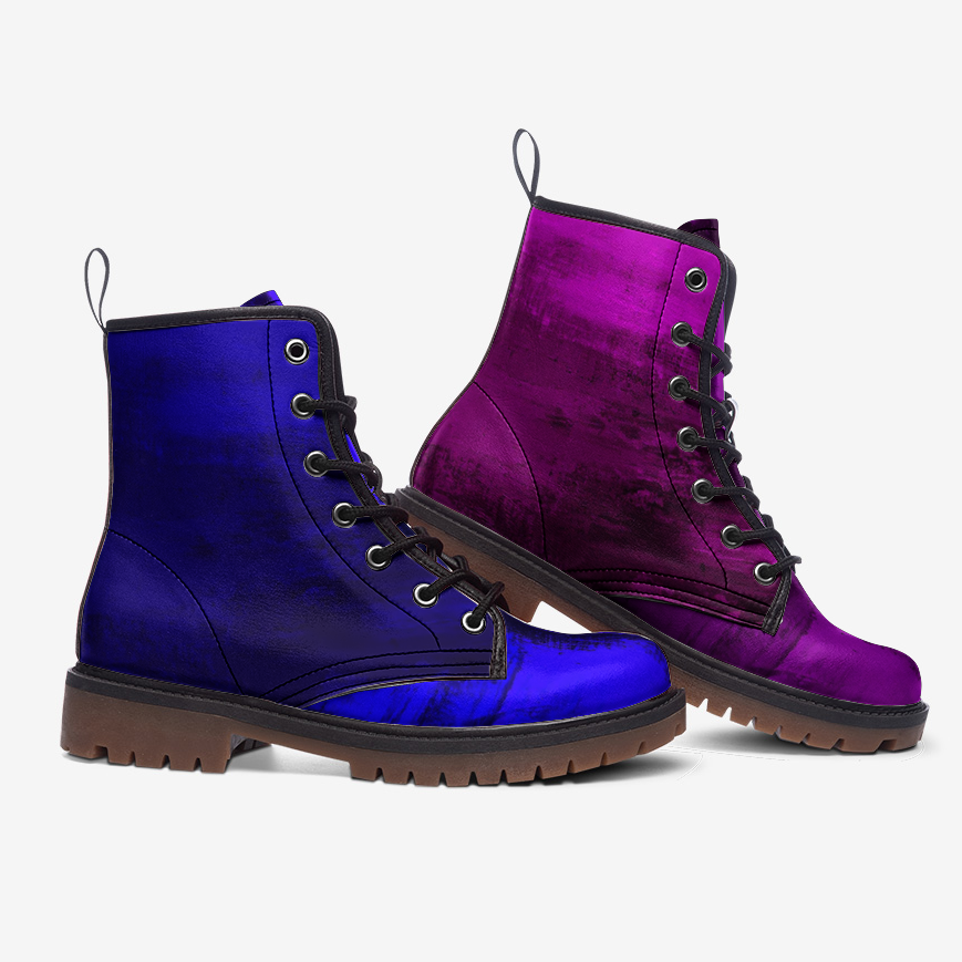 a pair of purple and blue boots on a white background
