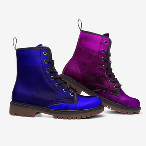 a pair of purple and blue boots on a white background