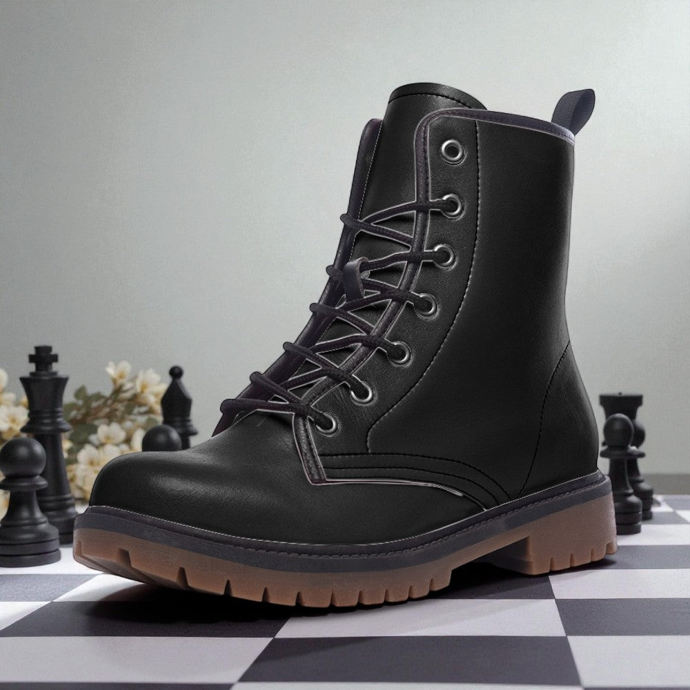 A black leather boot with a lace-up design sits on a checkered surface, surrounded by chess pieces.