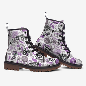 a pair of white and purple boots with skulls on them